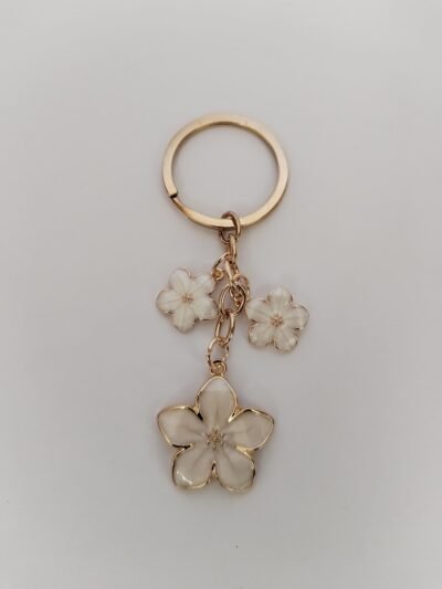 Arete Trío de Flores con Baño Dorado